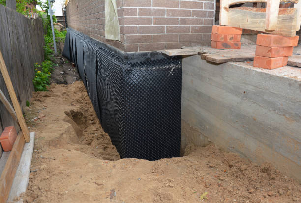 Happy homeowners after waterproofing job in Skokie